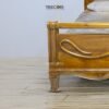 Timeless Wooden Bed with Carved Elegance