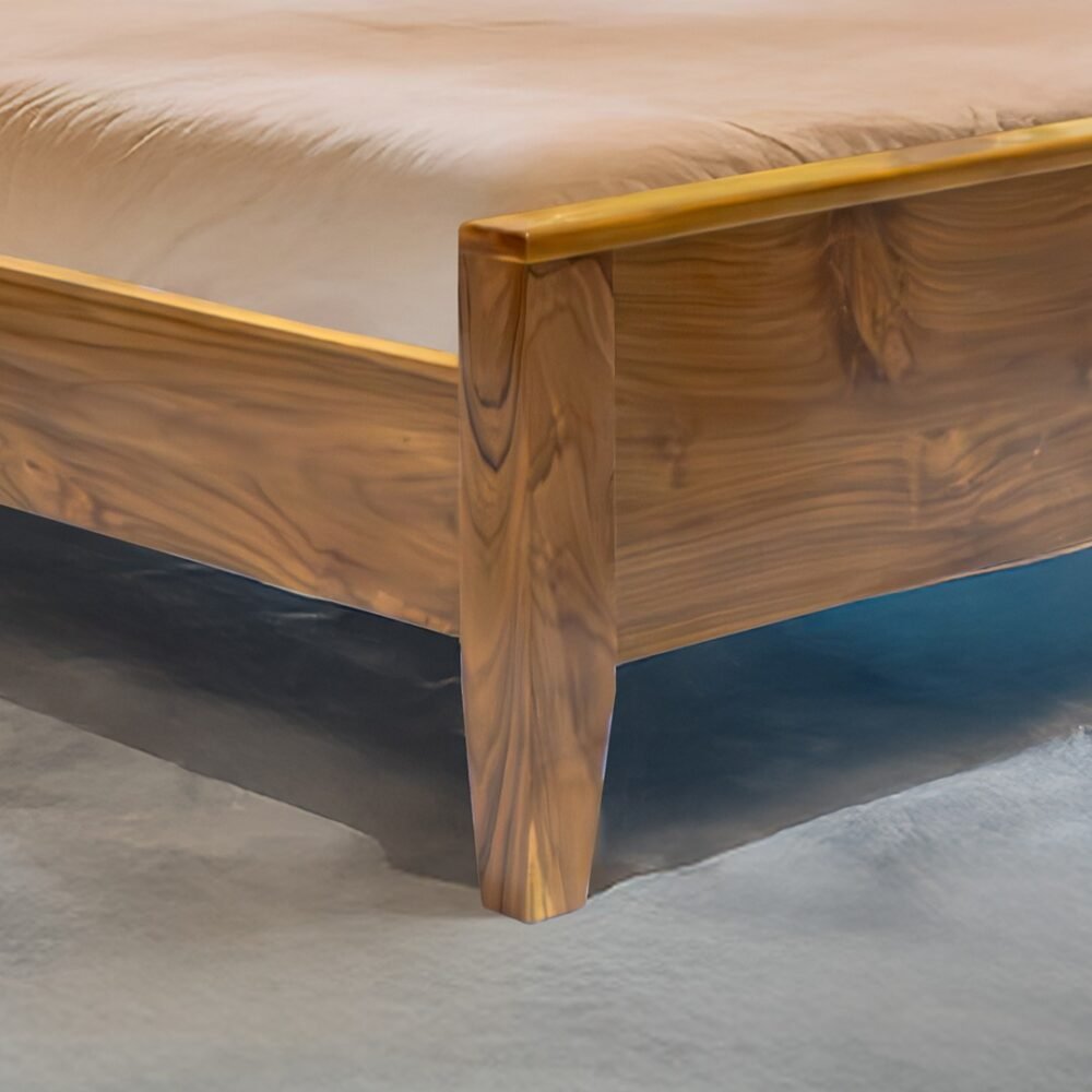 The Elegant Fabric Accent Bed combines solid teak wood, light fabric headboard, and satin finish for timeless bedroom comfort and refined elegance.