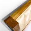 The Elegant Fabric Accent Bed combines solid teak wood, light fabric headboard, and satin finish for timeless bedroom comfort and refined elegance.