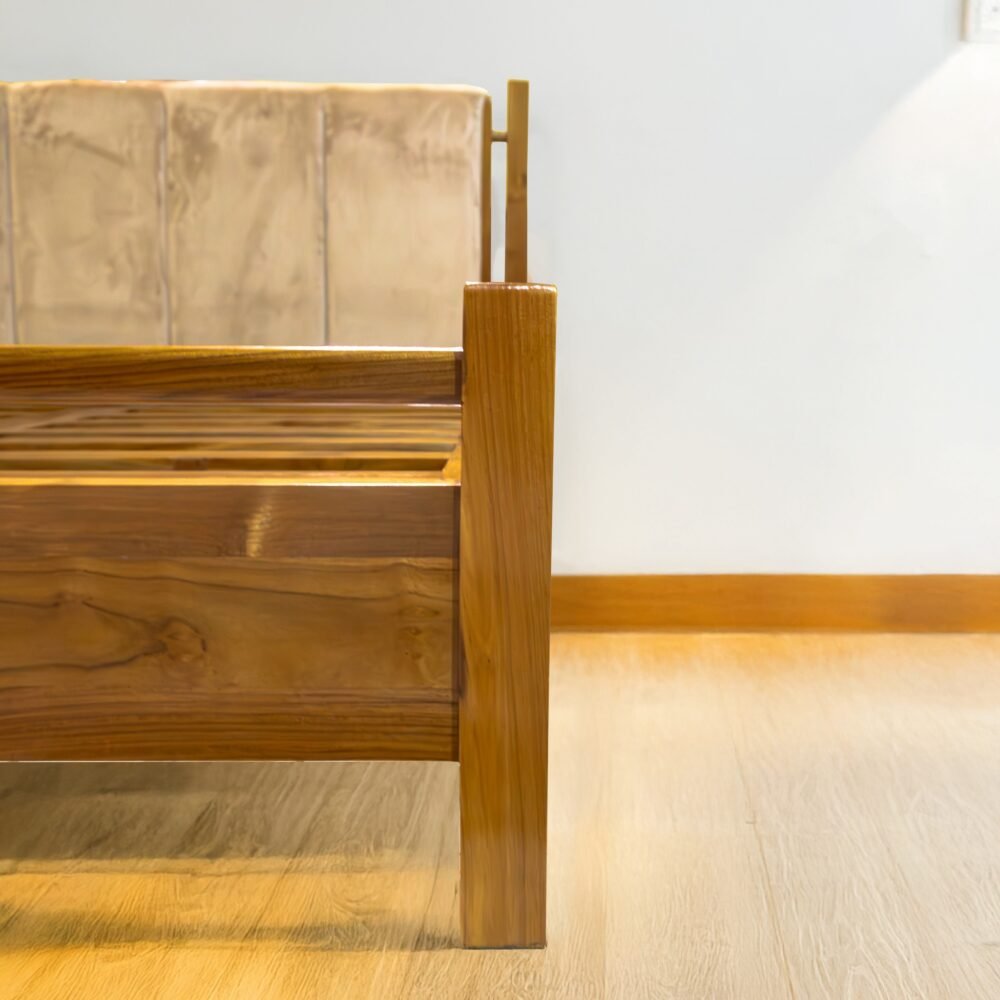 The Minimalist Solid Wooden Bed features solid teak wood, a soft touch headboard, and a natural satin finish for timeless bedroom elegance.