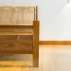 The Minimalist Solid Wooden Bed features solid teak wood, a soft touch headboard, and a natural satin finish for timeless bedroom elegance.