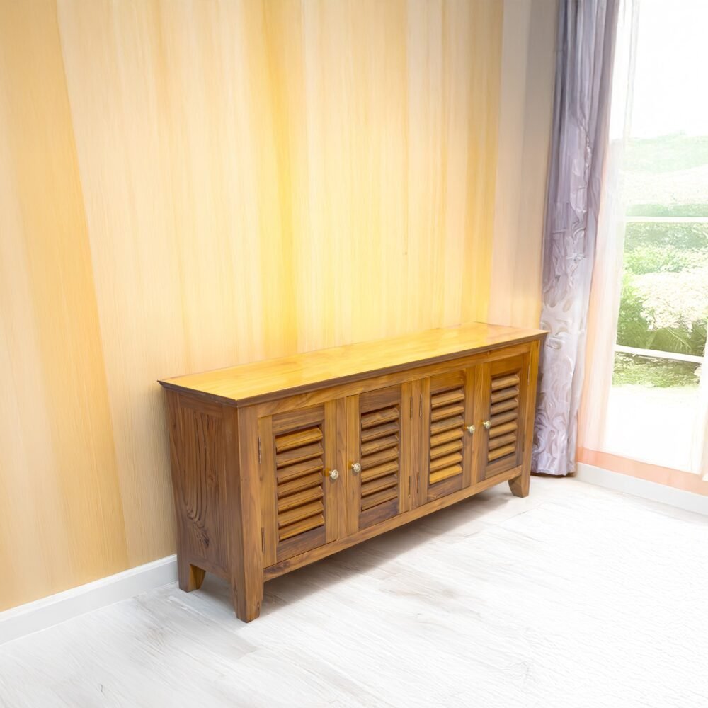 The Slatted Door Buffet, crafted from solid teak wood with satin finish, offers elegant storage with timeless design and practical functionality.