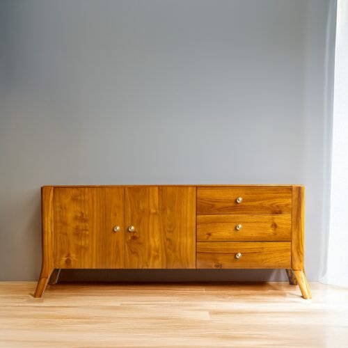 The Clean Line Wooden Sideboard, crafted from solid teak with satin finish, offers versatile drawers and elegant clean-line design for timeless interiors.