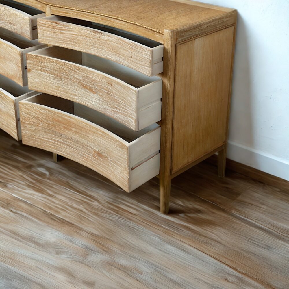 The Rustic Farmhouse Style Sideboard features teak wood, woven rattan surface, and six drawers, combining rustic charm with functional storage solutions.