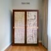 The Artisan Woven Rattan Sliding Wardrobe combines teak wood strength and rattan charm with satin finish for timeless, functional elegance.