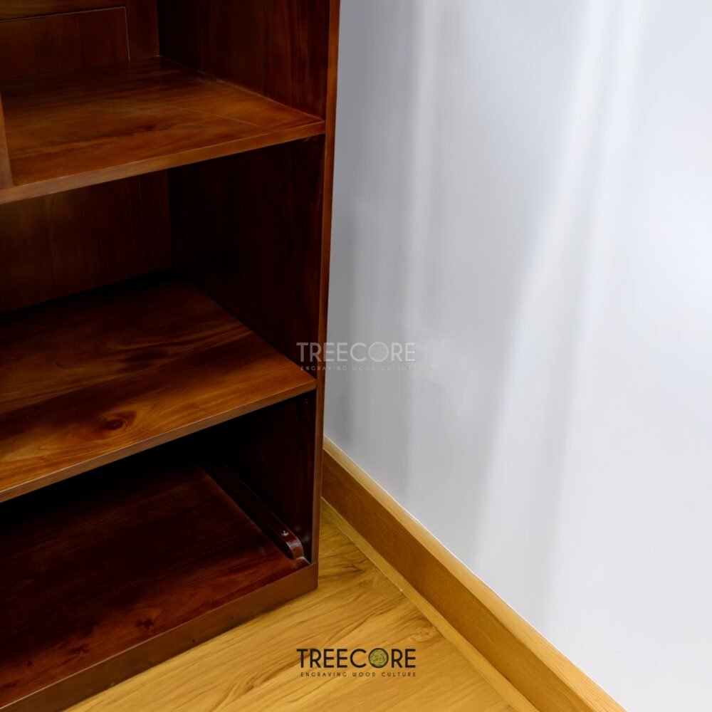 The Open Wardrobe with Drawer, made of teak wood with satin finish, offers stylish open storage and practical drawer functionality.
