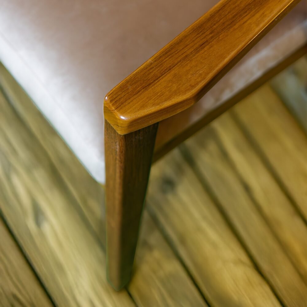 Experience elegance and comfort with the Rattan Dining Wood Chair, featuring teak wood, rattan accents, and cushioned seating for timeless interiors.