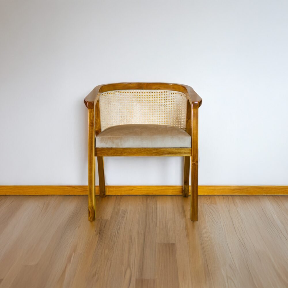 Experience elegance and comfort with the Rattan Dining Wood Chair, featuring teak wood, rattan accents, and cushioned seating for timeless interiors.
