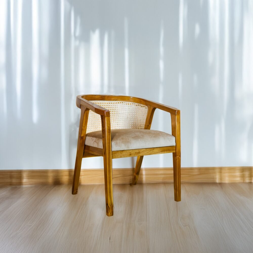 Experience elegance and comfort with the Rattan Dining Wood Chair, featuring teak wood, rattan accents, and cushioned seating for timeless interiors.
