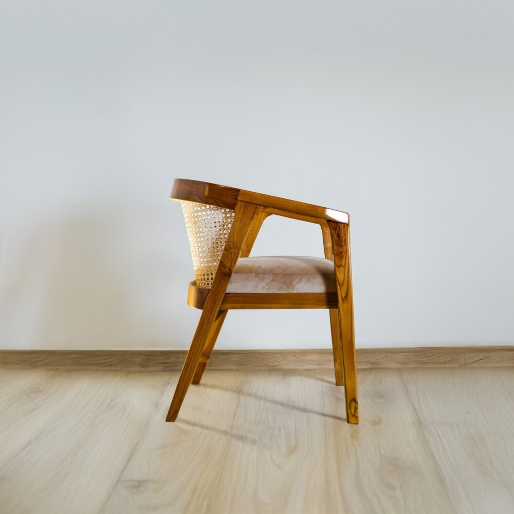 Experience elegance and comfort with the Rattan Dining Wood Chair, featuring teak wood, rattan accents, and cushioned seating for timeless interiors.
