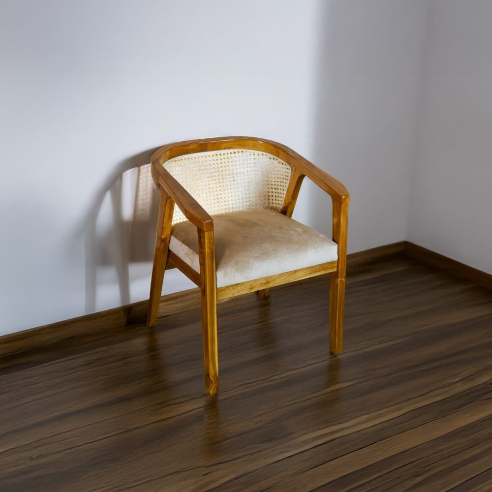Experience elegance and comfort with the Rattan Dining Wood Chair, featuring teak wood, rattan accents, and cushioned seating for timeless interiors.