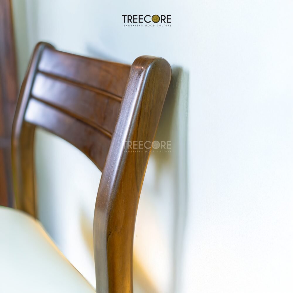 Upgrade your workspace with the Minimalist Design Study Chair, crafted from teak wood with a cushioned seater and elegant satin finish.