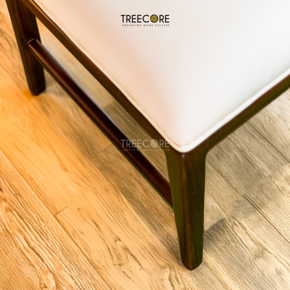 Upgrade your workspace with the Minimalist Design Study Chair, crafted from teak wood with a cushioned seater and elegant satin finish.