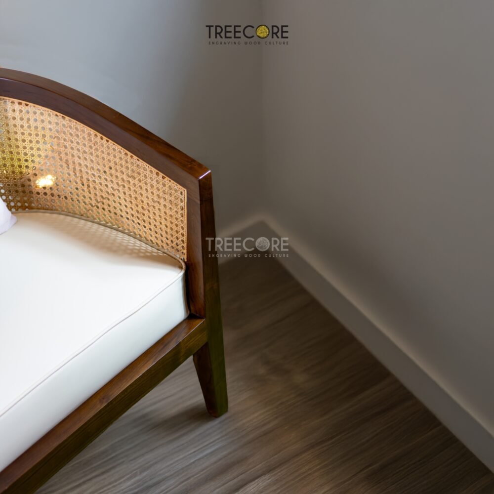 Experience timeless elegance with the Classic Teak Rattan Chair, crafted from teak wood with rattan accents and a soft cushioned seater.