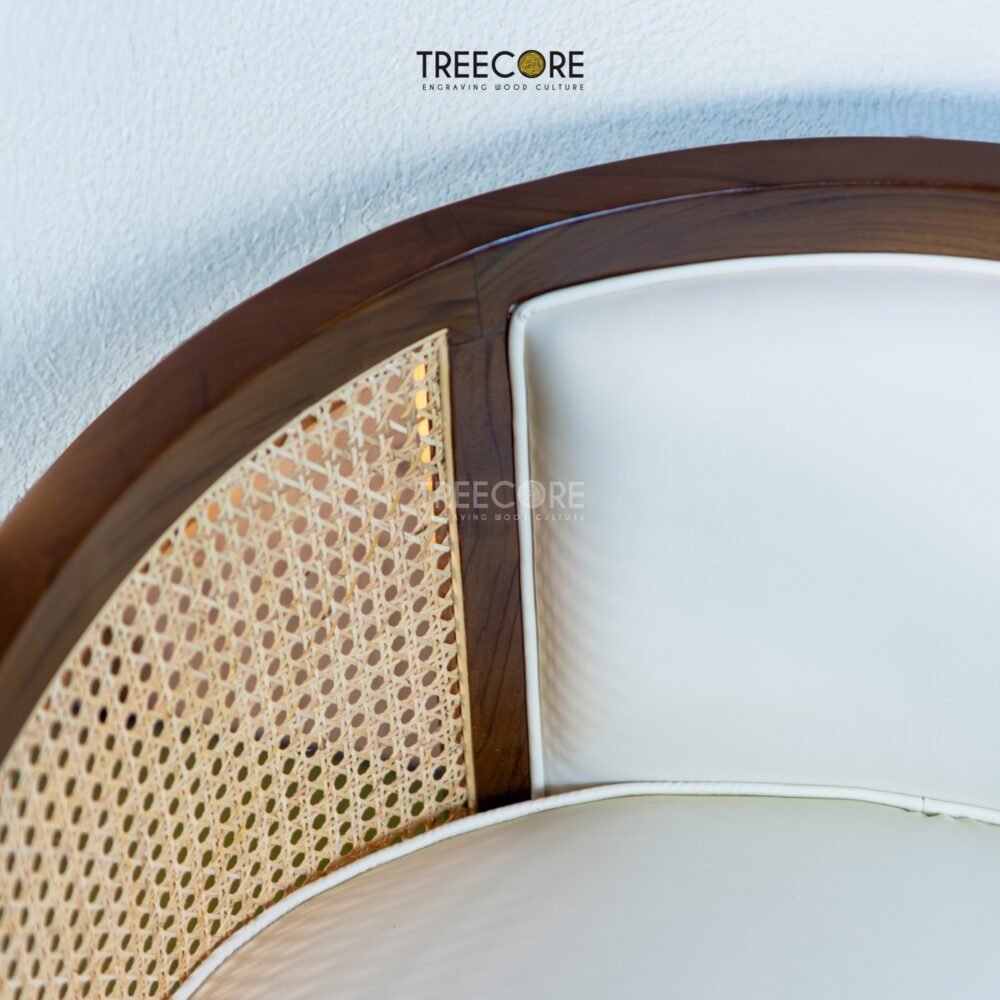 Experience timeless elegance with the Classic Teak Rattan Chair, crafted from teak wood with rattan accents and a soft cushioned seater.