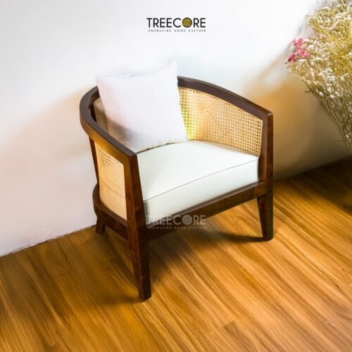 Experience timeless elegance with the Classic Teak Rattan Chair, crafted from teak wood with rattan accents and a soft cushioned seater.