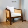 Experience timeless elegance with the Classic Teak Rattan Chair, crafted from teak wood with rattan accents and a soft cushioned seater.