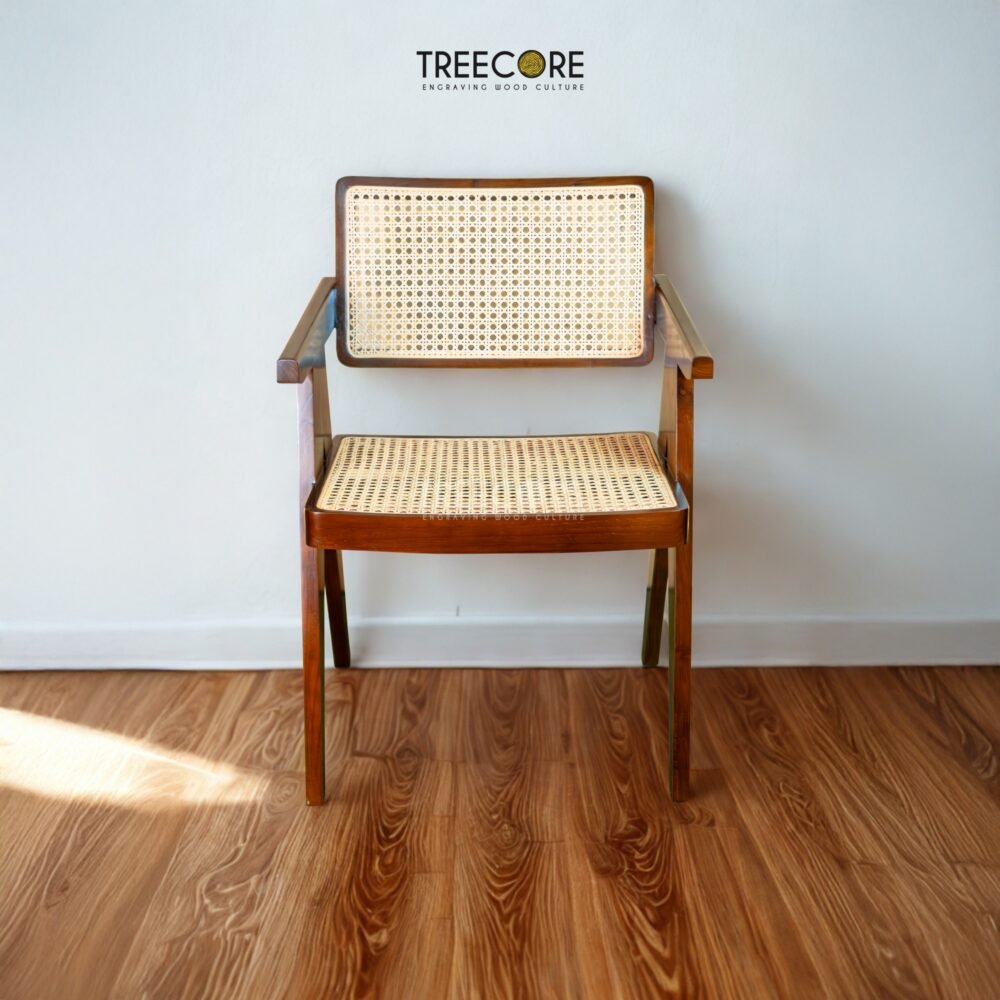 Enhance your dining space with the Natural Rattan Dining Chair, featuring a teak wood frame, woven rattan seating, and satin finish.