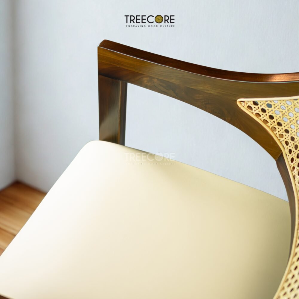 Experience comfort and style with the Scandinavian Rattan Dining Chair, featuring teak wood frame, rattan backrest, soft foam cushions, and satin finish.