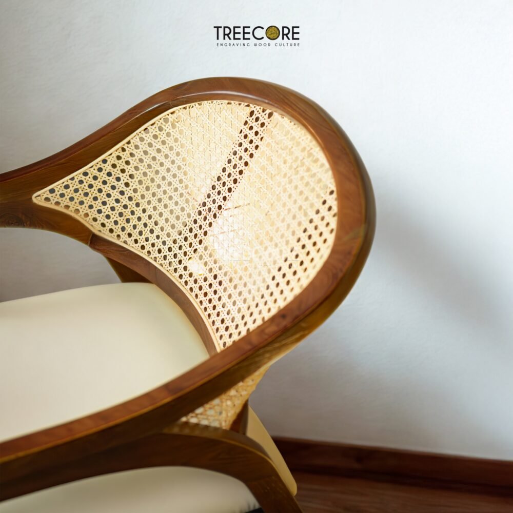 Experience comfort and style with the Scandinavian Rattan Dining Chair, featuring teak wood frame, rattan backrest, soft foam cushions, and satin finish.