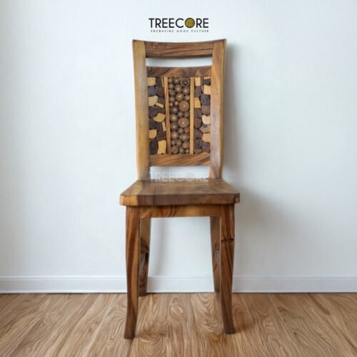 Bring artistic charm to your home with the Unique Mosaic Patterned Wood Chair, crafted from teak wood with a natural satin finish.
