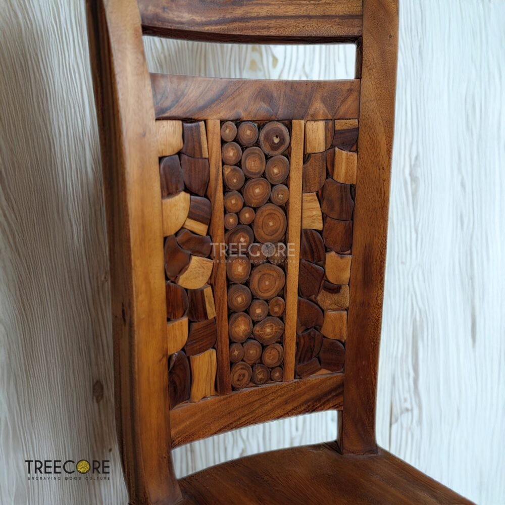 Bring artistic charm to your home with the Unique Mosaic Patterned Wood Chair, crafted from teak wood with a natural satin finish.