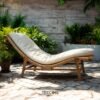 Experience timeless comfort with the Curved Rattan Lounge Chair, crafted from teak wood with natural satin finish and plush soft cushions.