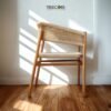Enhance your interiors with the Breeze Weave Wood Chair, crafted from teak wood with satin finish and stylish woven design.