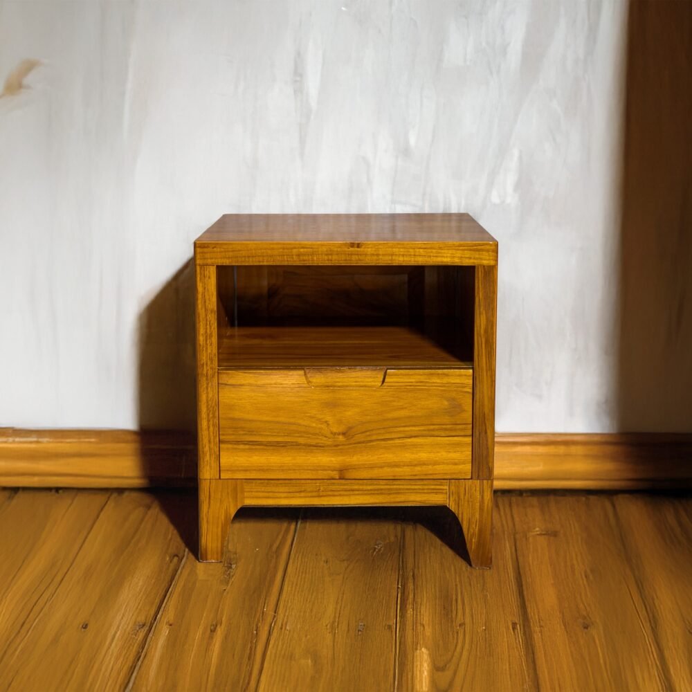 Elevate your space with the Elegant Teak Nightstand, featuring a single drawer, open shelf, and natural satin wood finish.