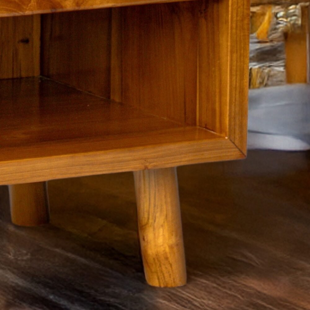 Enhance your space with The Single Drawer Teak Nightstand, featuring solid teak wood, natural satin finish, and a practical open drawer design.