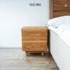 Elevate your interiors with the Teak Panel Side Table, featuring premium teak wood, unique panel design, and two smooth sliding drawers.