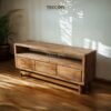 Rustic Wooden TV Cabinet made of teak wood with four drawers, offering functional storage and natural charm for living spaces.