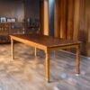 Experience timeless elegance with The Classic Hardwood Dining Table, crafted from durable teak wood with natural satin finish and spacious design.