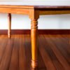 Experience timeless elegance with The Classic Hardwood Dining Table, crafted from durable teak wood with natural satin finish and spacious design.