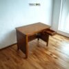 Discover The Minimalist Study Table, crafted from durable teak wood with satin finish and stylish drawer design for functional elegance.