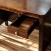 Discover The Minimalist Study Table, crafted from durable teak wood with satin finish and stylish drawer design for functional elegance.