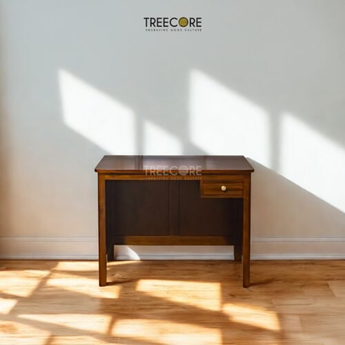 Discover The Minimalist Study Table, crafted from durable teak wood with satin finish and stylish drawer design for functional elegance.