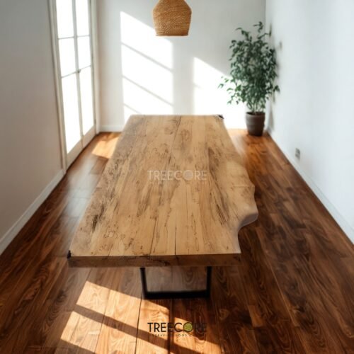 Enhance interiors with The Suar Live Edge Table, crafted from solid suar wood featuring unique live edge design and timeless durability.