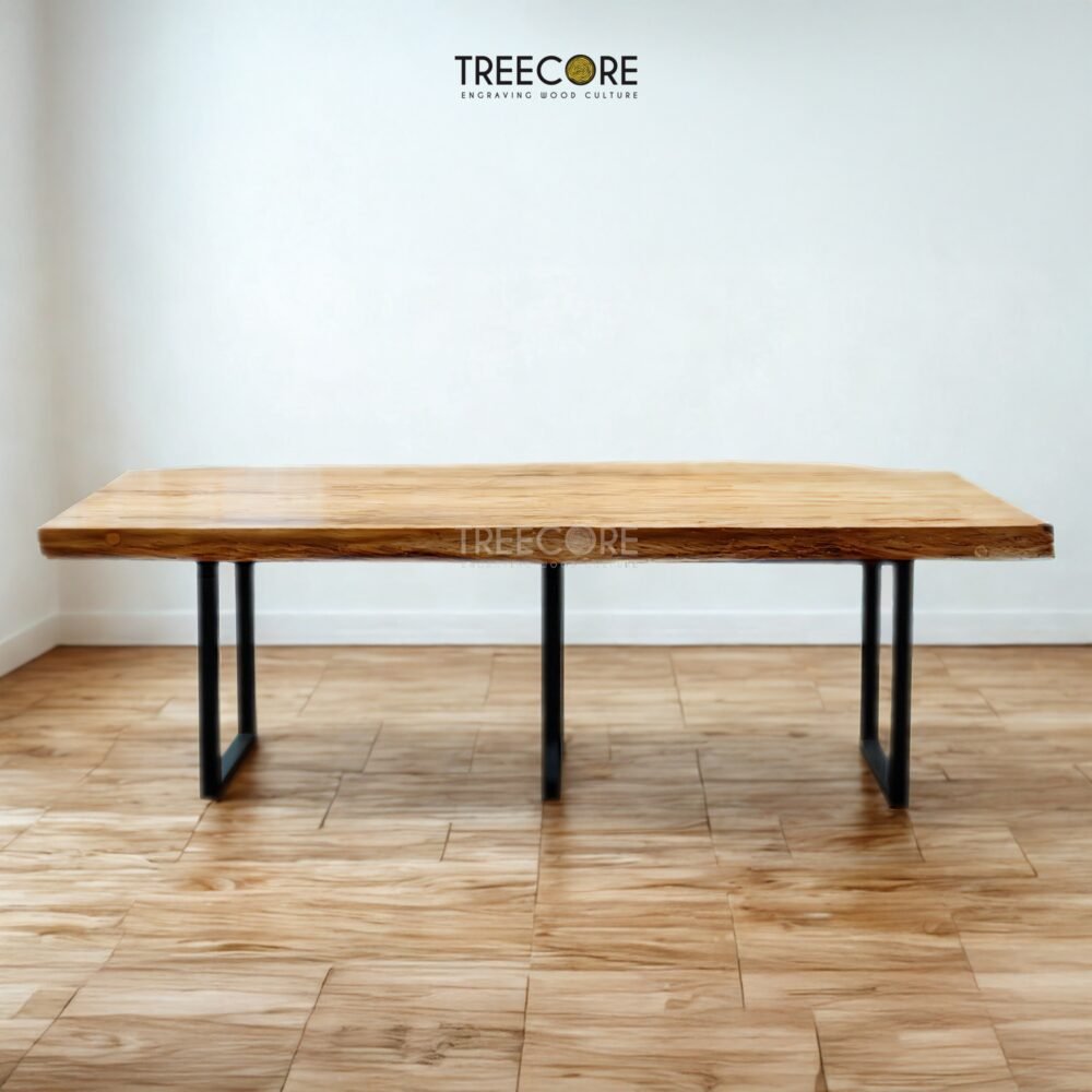 Enhance interiors with The Suar Live Edge Table, crafted from solid suar wood featuring unique live edge design and timeless durability.