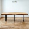 Enhance interiors with The Suar Live Edge Table, crafted from solid suar wood featuring unique live edge design and timeless durability.