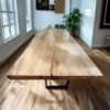 Enhance interiors with The Suar Live Edge Table, crafted from solid suar wood featuring unique live edge design and timeless durability.
